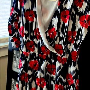 Trina Turk dress new with tags. Knee length. Long sleeves